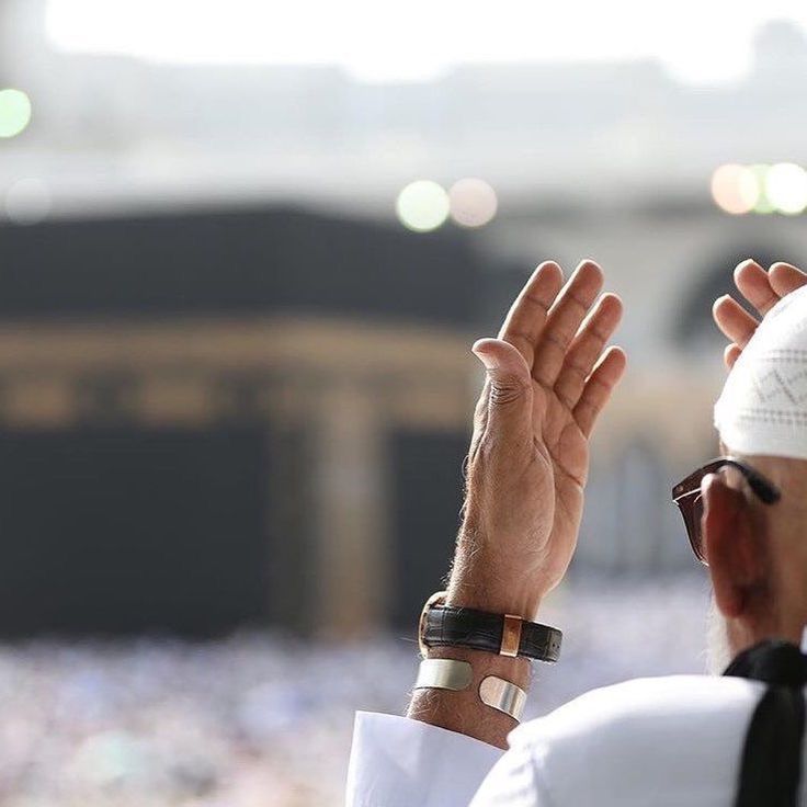 Hands raised in prayer